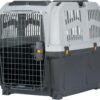 SKUDO 5 IATA Approved Pet Carrier L (81x55x58cm) for flying large dogs up to 35 kg from Dubai. Features secure metal door, storage pocket.